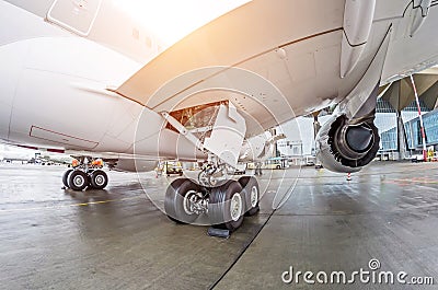 Wheels rubber tire rear landing gear racks, under wing engine rear back view Stock Photo