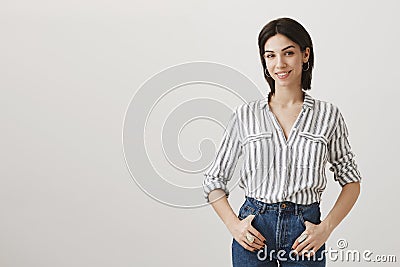 Where should we start. Confident attractive office worker in stylish clothes ready to tackle new problem, smiling Stock Photo