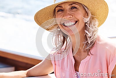 Where theres sea is where Ill be. Portrait of a mature woman enjoying a relaxing boat ride. Stock Photo