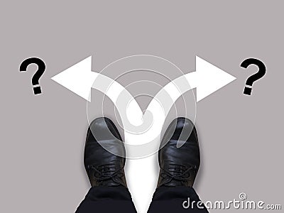 Which way - direction choices and decisions for businessman in black shoes with left and right directional arrows and question mar Stock Photo