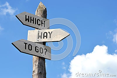 Which way to go? Crossroads sign with three arrows Stock Photo