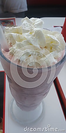 Whipcream and Strawberry Milkshake Stock Photo