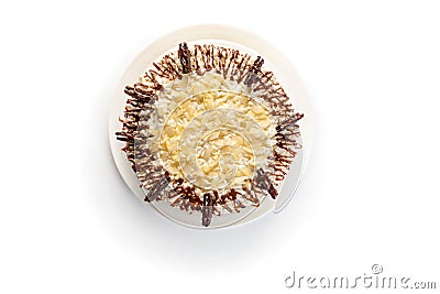 Whipped cream cake decorated with almond chips and chocolate on isolated white background Stock Photo