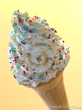 Whipped Ice Cream Cone with Candy Sprinkles Stock Photo