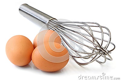 Whisk and Eggs Stock Photo