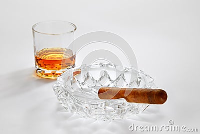 Whiskey, ashtray and cigar on white back Stock Photo