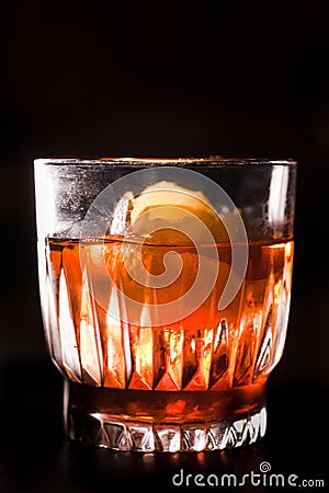 Whiskey and campari cocktail garnished with orange peel Stock Photo