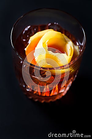 Whiskey and campari cocktail garnished with orange peel Stock Photo