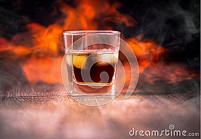 Whiskey on fire and ice Stock Photo