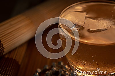 whiskey glass with ice over wood background Stock Photo