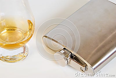 Whiskey Nosing Glass and Hip Flask Stock Photo