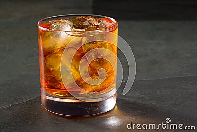 Whiskey whisky on the rocks on glass Stock Photo