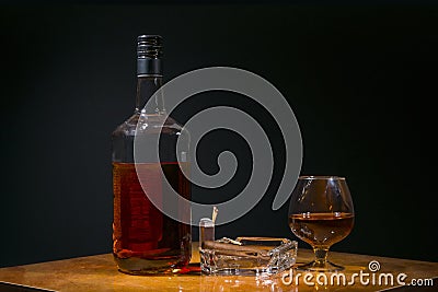 Whisky in bottle and shot glass Stock Photo