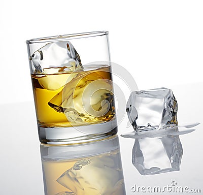 Whisky and ice cube Stock Photo