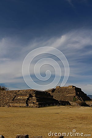 Whispy Clouds over Mexican Ruins Stock Photo