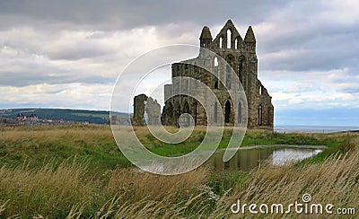 Whitby Abbey - ruins of gothic church above sea shore in England Stock Photo