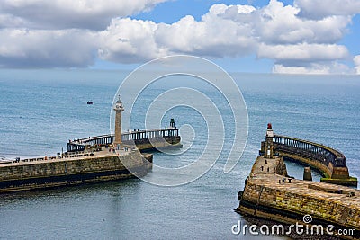 Whitby pier and lighthouse Editorial Stock Photo