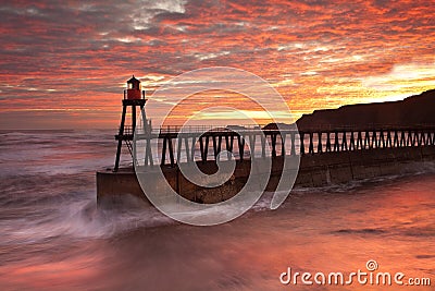 Whitby Pier at sun rise Stock Photo