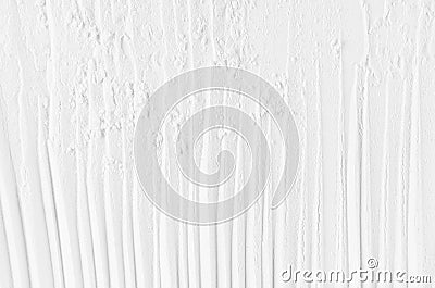 White abstract striped soft smooth crumbly plaster background with vertical folds. Stock Photo