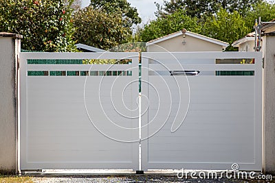 white aluminum modern high gate home portal of suburb city house Stock Photo