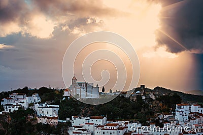 White Andalusian village - pueblo blanco - in the mountain range in Casares Stock Photo