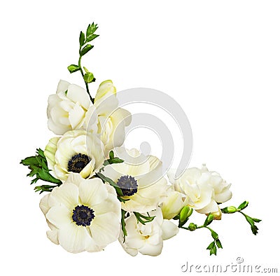 White anemones and freesia flowers in a corner arrangement Stock Photo