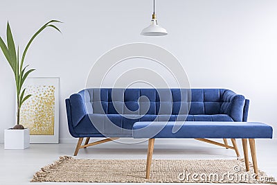 White apartment with blue sofa Stock Photo