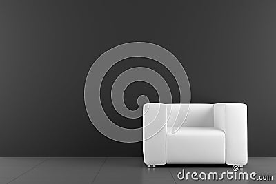 White armchair in front of black wall Stock Photo