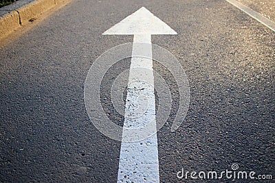 The white arrow indicating the direction Stock Photo