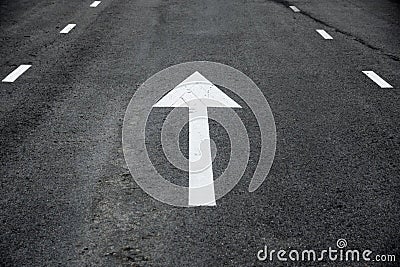 White Arrow Straight Ahead Traffic Signs perspective on the road Stock Photo