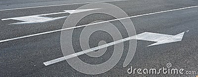 White arrows pointing directions Regulatory road sign proceed in direction indicated by arrow traffic Stock Photo