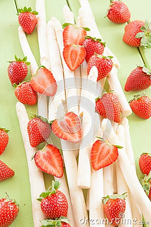 White aspargus and fresh strawberries Stock Photo