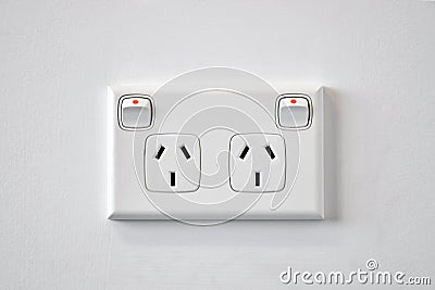 A white Australian wall power outlet. Stock Photo