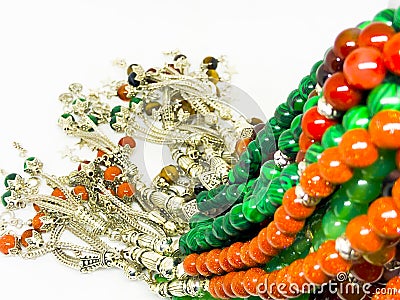 Colorful rosary varieties, white background. Stock Photo