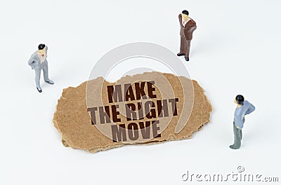 On a white background, figures of businessmen and torn cardboard with the inscription - MAKE THE RIGHT MOVE Stock Photo