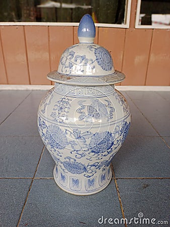 White background jar, blue writing, unique. Stock Photo