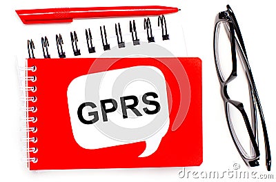 On a white background, white and red notepads, black glasses, a red pen and a white card with the text GPRS General Packet Radio Stock Photo