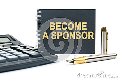 On a white background, there is a calculator, a pen and a black notebook with the inscription - BECOME A SPONSOR Stock Photo