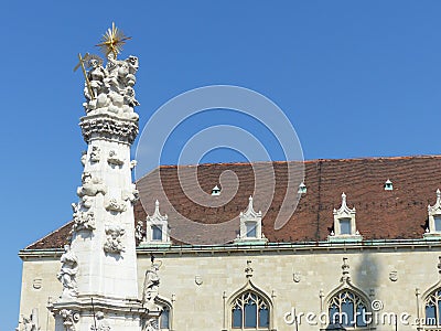 White baroque column with statues of saints in the district Buda of Budapest in Hungary. Editorial Stock Photo