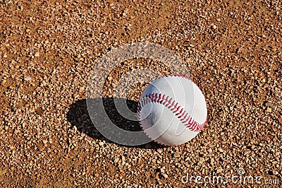 White Baseball on the Infield Stock Photo