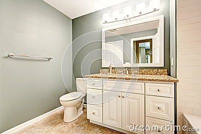 White bathroom vanity cabinet with granite top Stock Photo