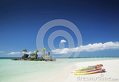 white beach and christian shrine and paddle boats on boracay tropical island in philippines Stock Photo