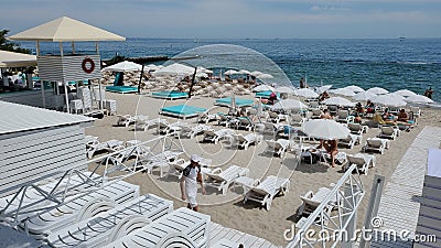 White beach furniture on beach at coastline Editorial Stock Photo