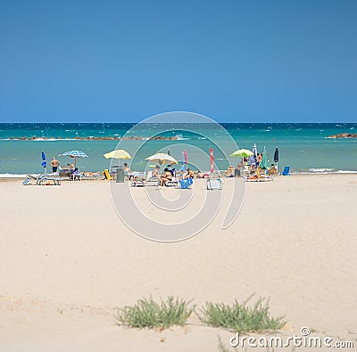 White beaches italy. sea sky people umbrellas sun beds. Editorial Stock Photo