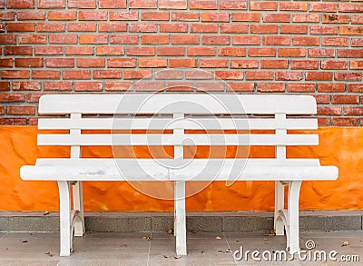White bench with stone Background Stock Photo