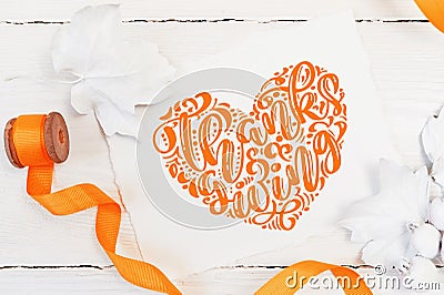 White berries, pumpkin, leaves and orange ribbon on a wooden mockup autumn background. Greeting card for Thanksgiving Stock Photo