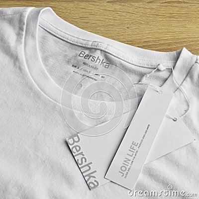 White Bershka L t-shirt and blank label, may 01 2022 Istanbul Maltepe Turkiye Bershka store Editorial Stock Photo