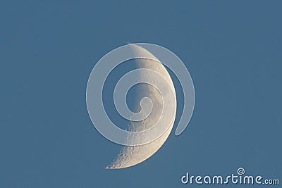 White big rising young moon close-up view Stock Photo