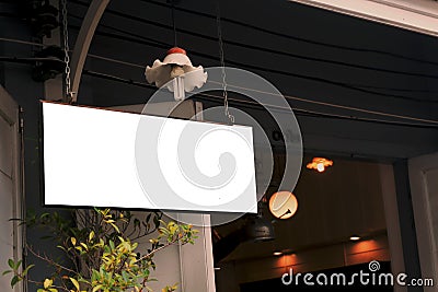 White billboard in front of a food store Stock Photo