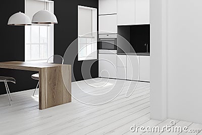 White and black kitchen, transparent chair corner Stock Photo